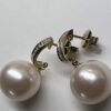 Curved Diamond Top with Large Round Pearl